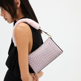 Mini Prism Lilac Croc Embossed with a model 