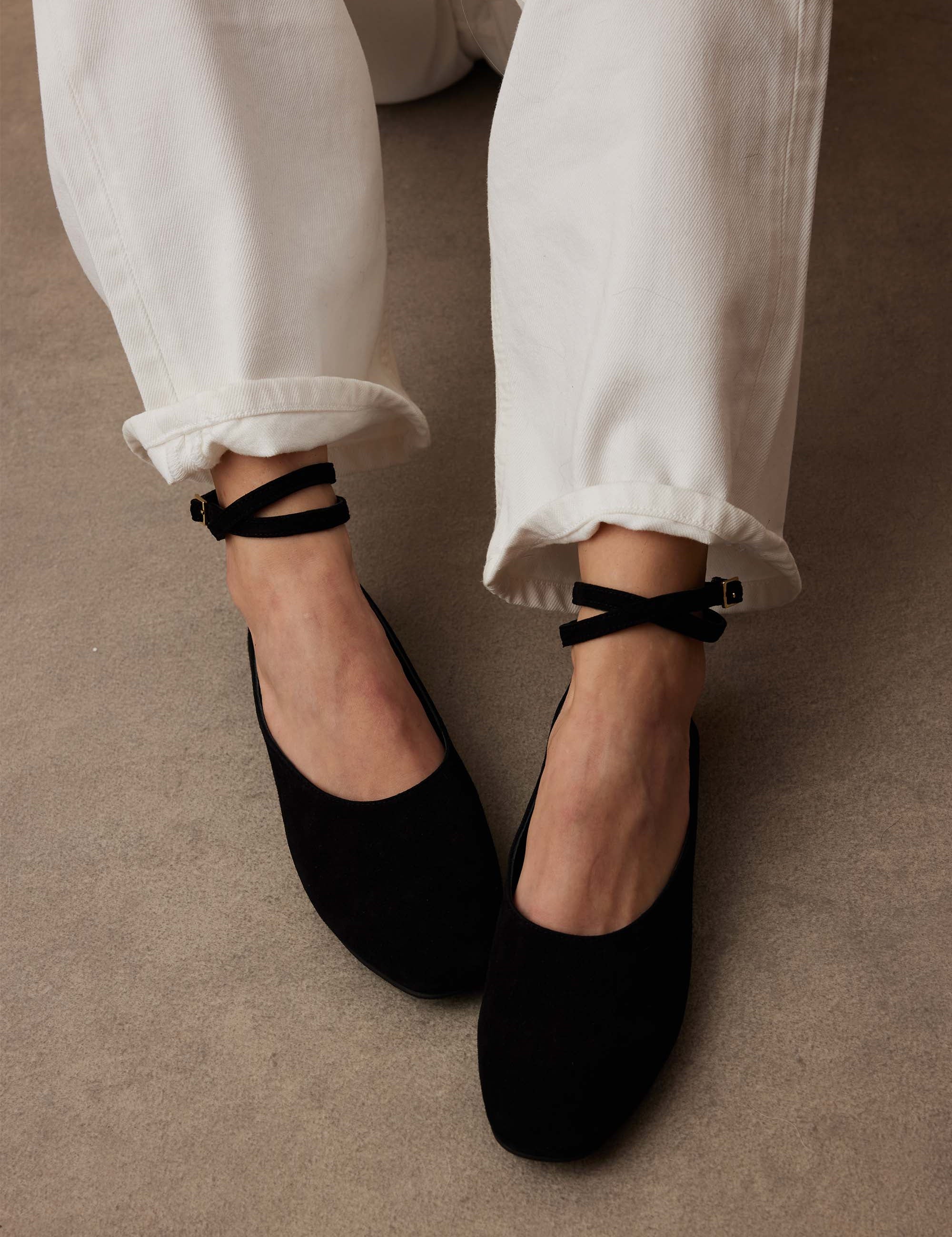 Manu Ballet Flats With Cross Over Ankle Strap Black Suede with a model