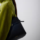 mini tote du jour black soft on model